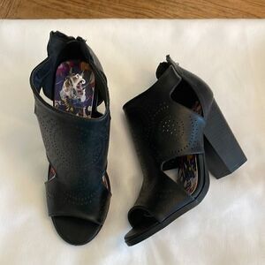 CHRISTIAN LACROIX BLACK CUTOUT SHOOTIES.  NEW IN BOX